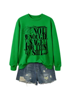 Close-up of the green long sleeve sweatshirt featuring a unique sage quote graphic print.