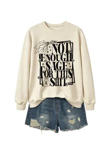 Women casual long sleeve crewneck sweatshirt paired with stylish distressed denim shorts.