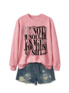 Pink long sleeve sweatshirt with funny sage typography paired with denim shorts for women.