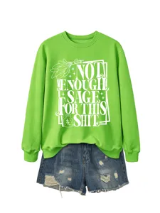 Neon green graphic sweatshirt featuring a funny front print and paired with denim shorts.