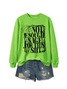 Women long sleeve lime green crewneck sweatshirt with novelty slogan and denim shorts.