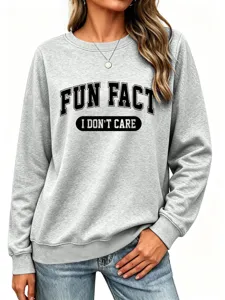 Sweat-shirt gris décontracté pour femme avec motif de lettres imprimé tendance et confortable.