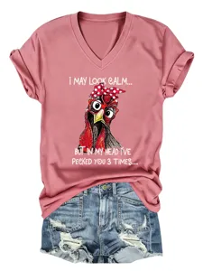 Detailed close-up view of the funny chicken graphic print on pink V-neck short sleeve t-shirt.