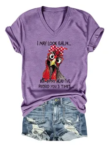 Detailed view of purple V-neck short sleeve t-shirt with funny chicken graphic print.