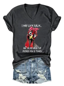 Close-up detail of dark grey V-neck short sleeve t-shirt with funny chicken graphic and quote.