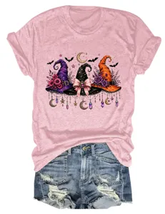 Close-up detail shot of women's casual pink short sleeve t-shirt with hats print.
