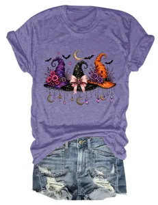 Women casual purple short sleeve t-shirt with Halloween witch hats graphic print.