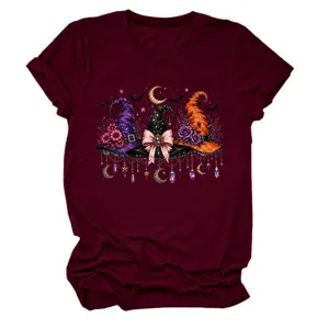 Women's graphic short sleeve crew neck t-shirt featuring witch hats and moon details.