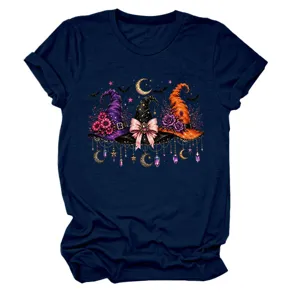 Close-up detail of the navy blue graphic tee featuring witch hats, bats, and moon print.