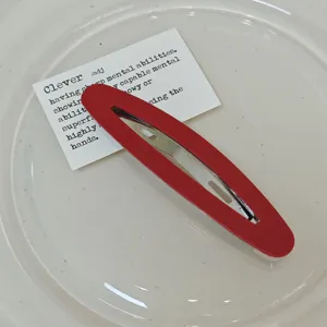 Korean vintage red oval snap hair clip for women, chic BB hair pin styling accessory.