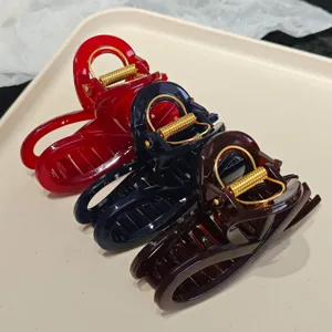 Large resin hair claw clips set, stylish shark clips for women, secure hold daily hair accessories.