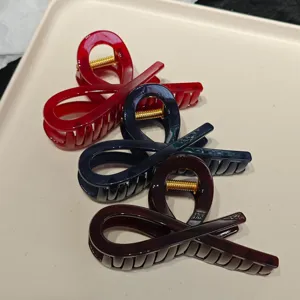 Large cross hair claw clip set, elegant resin shark clip for women and girls daily styling.