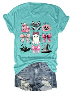 Cute Halloween ghost pink bow print teal t-shirt paired with denim shorts detail view.