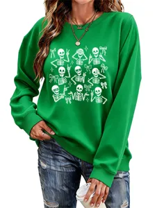 Women's Halloween casual long sleeve green sweatshirt featuring cute skeleton bows print. Detail view.
