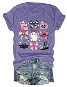 Cute pink Halloween ghost and bow graphic detail on purple short sleeve t-shirt close up