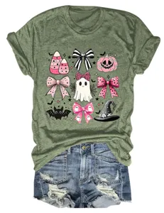 Close-up of olive green short sleeve t-shirt with pink Halloween ghost and bow graphic print.
