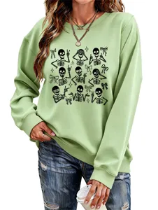 Women long sleeve crewneck sweatshirt featuring detailed skeleton and bow graphic print.