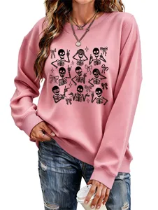 Women casual pink skeleton sweatshirt with cute bows and stars for Halloween fashion wear.