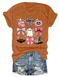 Detailed view of women casual orange short sleeve t-shirt with cute pink Halloween graphics.