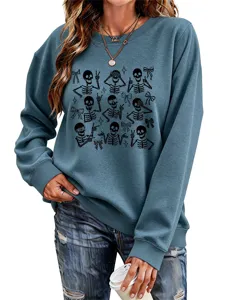 Close-up view of the casual grey-blue women's sweatshirt featuring cute Halloween skeleton and bow.