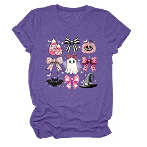Close up detail of the cute Halloween pink bow and ghost graphic printed on purple t-shirt.