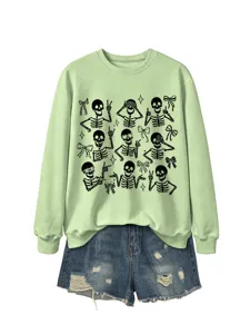 Women's cute Halloween skeleton graphic crewneck sweatshirt paired with denim shorts.