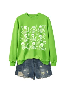 Details view of women Halloween crewneck sweatshirt featuring cute skeleton and bow prints.