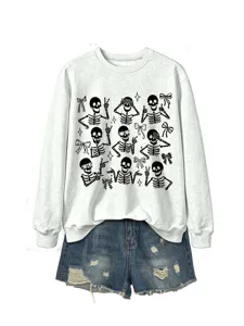 Women casual long sleeve crewneck sweatshirt with cute skeleton print and denim shorts outfit.