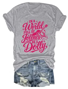 Detailed view of grey short sleeve graphic t-shirt featuring pink lettering and guitar print.