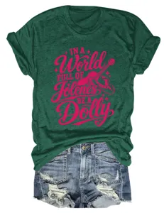 Casual green short sleeve t-shirt with fun pink letter print paired with denim shorts.