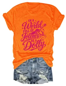 Detailed view of the orange short sleeve graphic tee featuring fun pink typography.