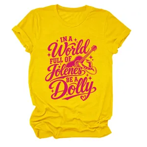 Close-up detail of the bright yellow women graphic t-shirt featuring stylish pink typography.