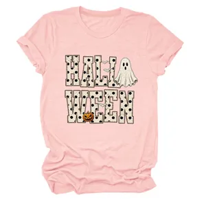 Close-up of the cute Halloween ghost and pumpkin graphic printed on the pink cotton t-shirt.
