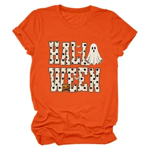 Close-up detail of the Halloween themed graphic print on the orange short sleeve t-shirt.