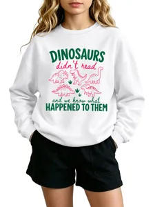 White graphic crewneck sweatshirt for women featuring funny dinosaur text print casual style.