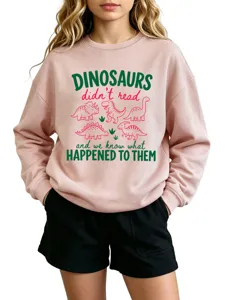 Cute funny dinosaur graphic crewneck sweatshirt for women, casual long sleeve pullover top.