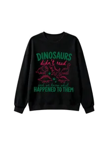Detailed view of the black dinosaur graphic long sleeve sweatshirt, cozy casual style.