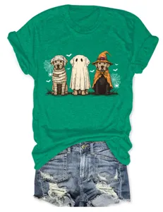 Halloween ghost dog graphic green short sleeve t-shirt paired with denim shorts, casual fit.