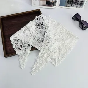 White hollow lace triangle scarf for women, elegant floral knit neckerchief and travel shawl.
