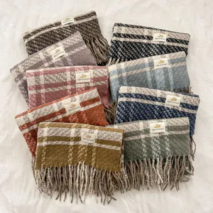 Cozy imitation cashmere plaid scarf with stylish fringe, warm and soft winter accessory.