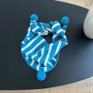 Kids blue white striped knitted scarf detail, soft warm winter baby neck warmer with pom pom.