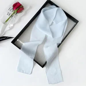 Light blue solid color long silk scarf, elegant hair ribbon or bag accessory for women.