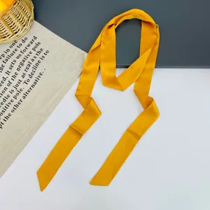 Solid color thin silk scarf for bag handle and hair band, elegant yellow satin ribbon.