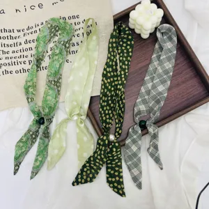 Vintage green patterned long ribbon scarf necklace with pearl bead detail for women.