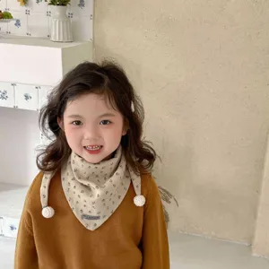 Cute toddler girl triangle scarf detail shot, warm autumn winter windproof baby neck warmer shawl.