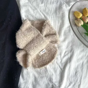 Kids beige cross loop yarn winter scarf detail, cozy toddler neck warmer for daily wear.