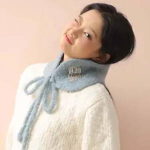 Korean candy colored knitted scarf detail, cozy winter neck warmer and stylish fashion accessory.