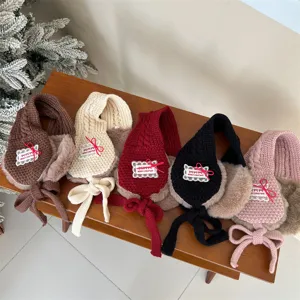 Kids plush ear muffs winter warm knitted earmuffs with cute bow tie design for cold weather