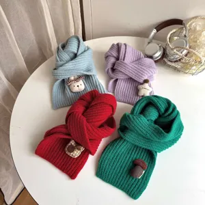 Children winter warm knitted scarf detail, cute cartoon plush patch, soft solid color neck warmer.
