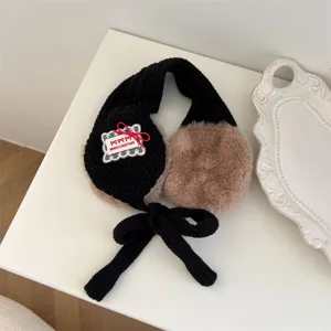 Children winter warm earmuffs, black knitted plush ear warmers with cute bow and ribbon ties.